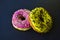 American delicious donuts on a black background