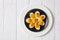 American deviled eggs on a plate, copy space