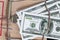American dollar bills in a mousetrap close up. Concept: financial trap, lending, debt