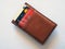 American Express Credit Card in Small Brown Leather Wallet