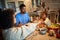 American Family Family dining at home celebrating christmas eve with traditional food and decoration