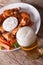 American fast food: buffalo wings and beer close-up vertical