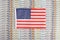 American flag on a background from dollar banknotes. Concept of the relationship of the American money in relation to the dollar,
