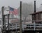 American Flag Blows in Foggy Maine Harbor