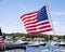 American flag on boat in marina