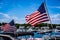 American flag on boat in marina