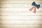 American Flag Bow on White Rustic Board Background with room or space for copy, text. Horizontal sepia processing