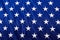 American Flag Closeup White Stars Blue Background