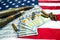 American flag with dollars money, bullets, shells, cartridges and projectiles on it. Lend-Lease concept.  Army concept. Sales of