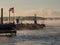American flag emerges from the morning mist at Sodus Bay, USA