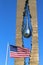 American flag in the front of September 11 memorial To the Struggle Against World Terrorism