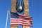 American flag in the front of September 11 memorial To the Struggle Against World Terrorism