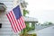 American Flag Hanging from a House