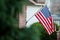 American Flag Hanging from a House