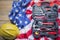 American flag with helmet and toolbox on table