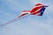 American Flag Kite Soars in Partly Cloudy Sky