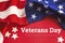 American flag on a red background. Veterans Day. honoring all who served. 11 november