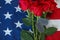 American flag with roses and military dog tags