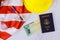 American flag on Stimulus financial relief check to the Passport of USA in hard hat