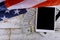 American flag and US dollar banknotes with digital tablet financial office