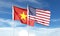 American flag and Vietnam flag on cloudy sky