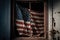 American flag in the window of an old abandoned building. The concept of war and political conflicts.