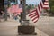 American Flags Lining The Street In Small Town