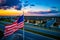 American Flags Suburbs home and houses aerial drone view north of Austin , Texas