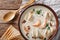 American food: New England chowder soup close-up on a in a