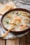 American food: New England chowder soup close-up on a in a