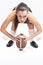 American Footbal Concepts and Ideas. Sportive Caucasian American Football Female Player Athlete Posing with Ball Against White