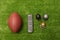 American football ball, little football helmets and remote control