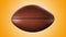 American football ball rotating in motion on orange screen. Looped American football 3d Animation. 3d. 4K