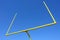 American Football Goal Posts over Blue Sky