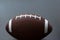 American football isolated on black background. Sport object concept