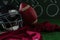 American football jersey, head gear and football lying on artificial turf against strategy board