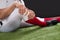 American football player with injury in leg