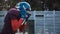 American football player putting on helmet