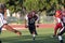 American Football Player Running with the Ball