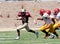 American Football Player Running with the Ball