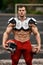 American football sportsman player, muscular man. Strong naked male abs