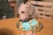 American hairless naked terrier eating cake for his birthday