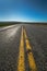 American highway horizon, lonely road and field.