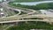 American highway turnpike with fast driving vehicles in Tampa, Florida. View from above of USA transportation