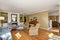 American living room interior with classic sofa set and hardwood floor.