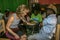 American medical team member checks blood pressure for a male patient during medical mission to rural Haiti.