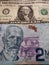 american one dollar bill and Costa Rican banknote of 2000 colones