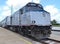 American passenger train diesel engine with coaches