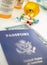 American passport along with several bottles of medicines, conceptual image