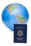 American passport in front of world globe, over white